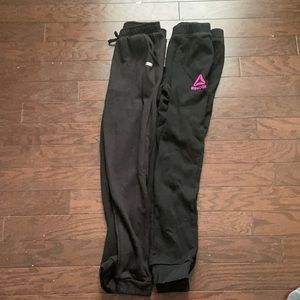 Two pairs of black sweat pants/joggers